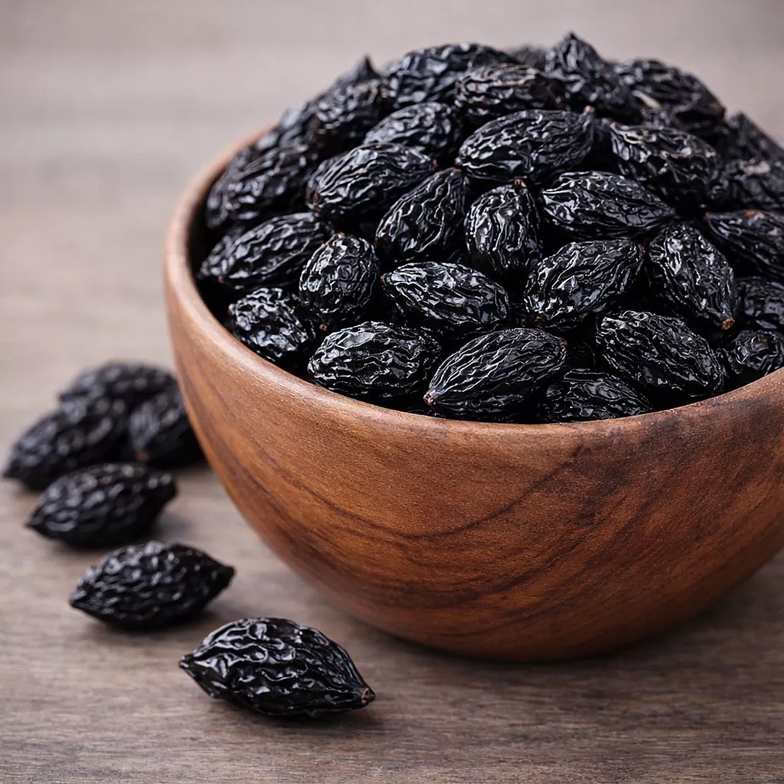 Bowl of whole dried plums